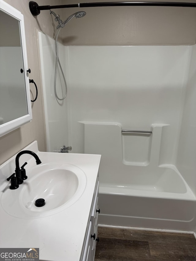 bathroom featuring hardwood / wood-style floors and vanity