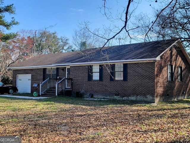 ranch-style house featuring brick siding and an attached garage