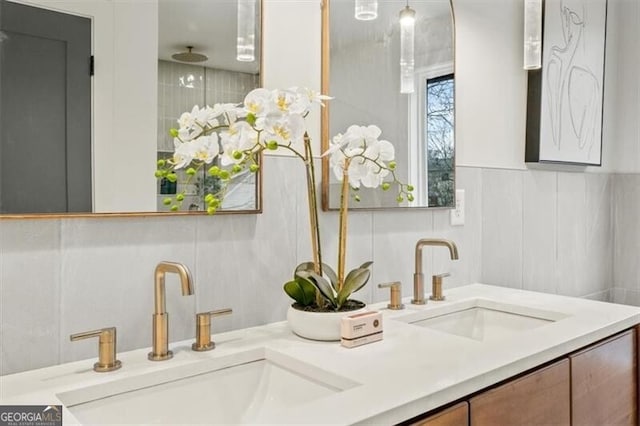 bathroom featuring double vanity and a sink