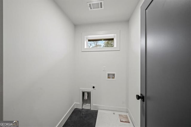 laundry room featuring washer hookup, visible vents, electric dryer hookup, laundry area, and baseboards