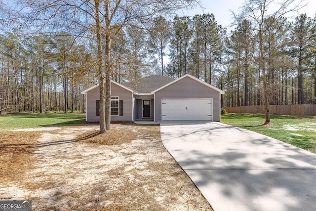 view of front facade featuring a garage and a front lawn