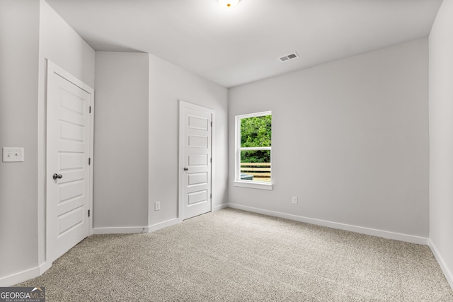 910 Bevis Rd, Franklin, GA 30217 - unfurnished bedroom with carpet floors and baseboards