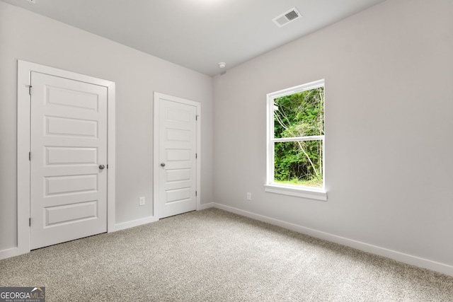 910 Bevis Rd, Franklin, GA 30217 - unfurnished bedroom featuring carpet flooring and baseboards