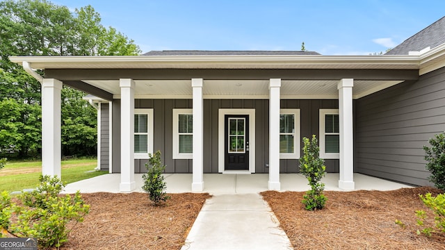910 Bevis Rd, Franklin, GA 30217 - doorway to property featuring board and batten siding, a porch, and roof with shingles