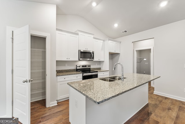 910 Bevis Rd, Franklin, GA 30217 - kitchen with appliances with stainless steel finishes, a sink, vaulted ceiling, white cabinets, and dark wood-style flooring