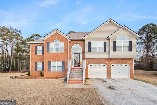 raised ranch featuring a garage