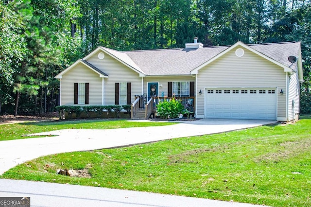 ranch-style house featuring a garage and a front lawn