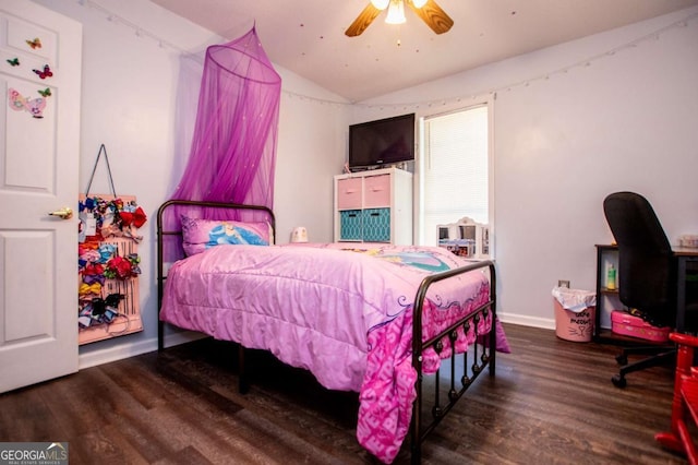 bedroom featuring dark wood-type flooring, ceiling fan, and vaulted ceiling