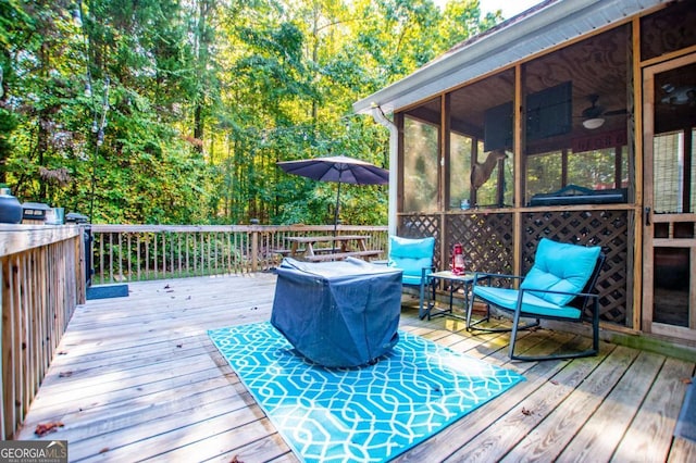 deck with a sunroom