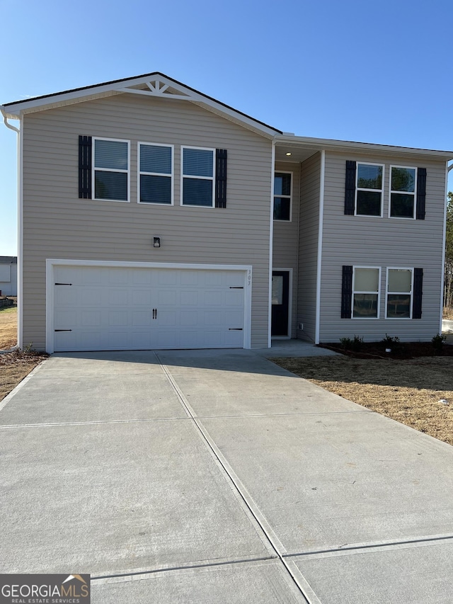 view of front of house with a garage