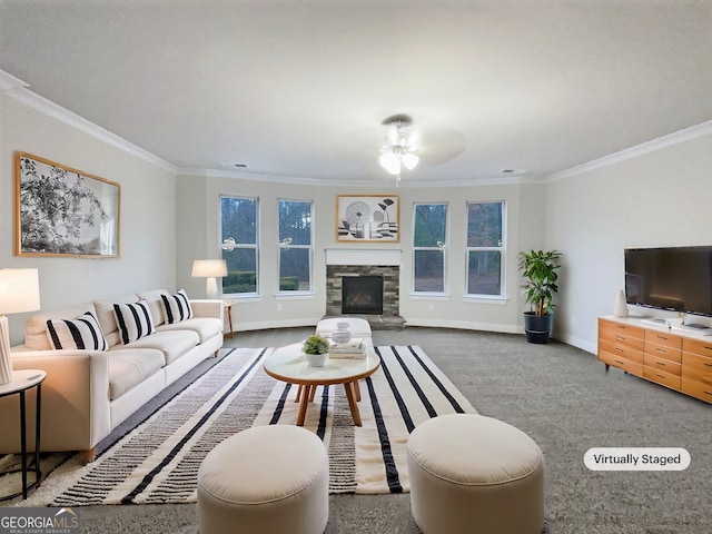 carpeted living room with ornamental molding and a fireplace