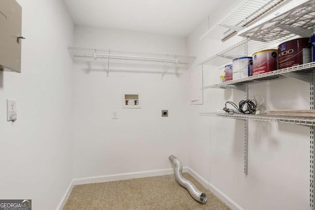 clothes washing area with hookup for an electric dryer, carpet floors, and washer hookup