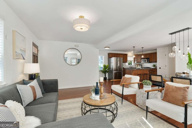 living room with light hardwood / wood-style flooring