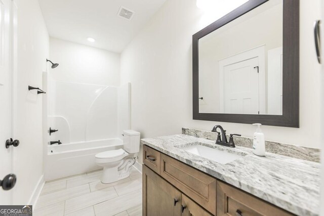 bathroom with vanity and plus walk in shower