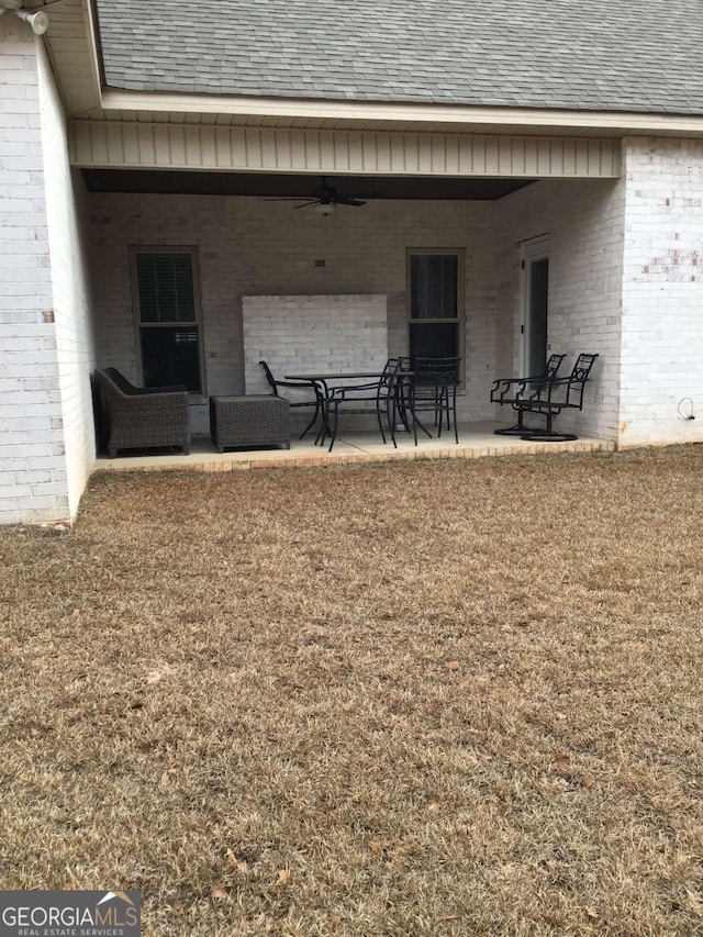 exterior space with a patio and ceiling fan