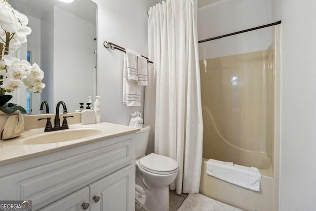 full bathroom with tile patterned flooring, vanity, shower / tub combo, and toilet