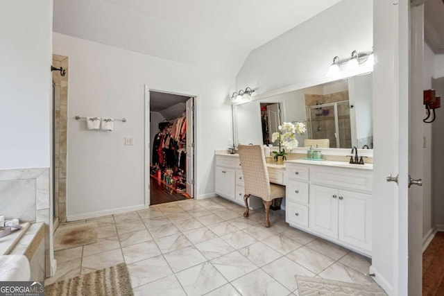 bathroom featuring tile patterned flooring, vanity, lofted ceiling, and separate shower and tub