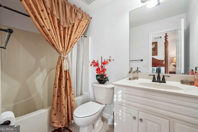 full bathroom featuring shower / bath combo, vanity, and toilet