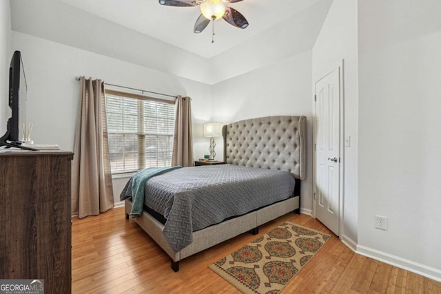 bedroom featuring ceiling fan and light wood-type flooring