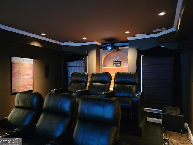 cinema with recessed lighting, crown molding, and carpet