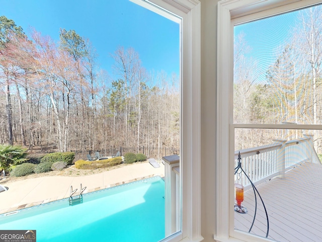 pool featuring a wooden deck