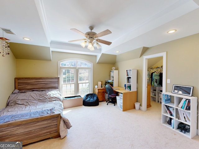 carpeted bedroom featuring a spacious closet, a ceiling fan, visible vents, and recessed lighting