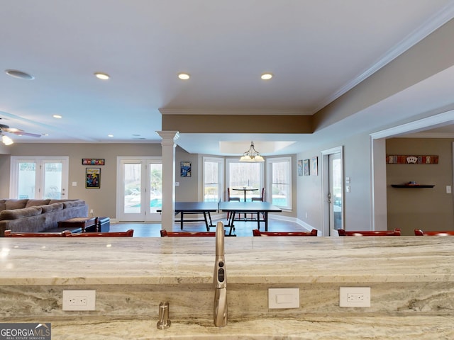 playroom featuring ornamental molding, recessed lighting, wood finished floors, and ornate columns