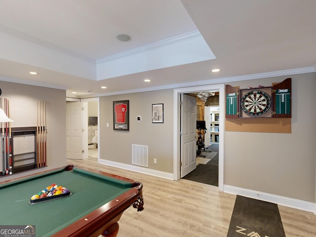 recreation room featuring recessed lighting, wood finished floors, visible vents, and crown molding