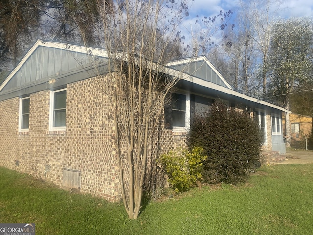 view of property exterior featuring a yard