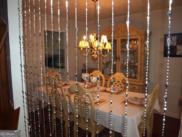 dining room with a notable chandelier