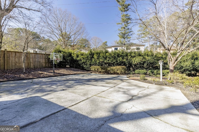 view of patio with basketball court