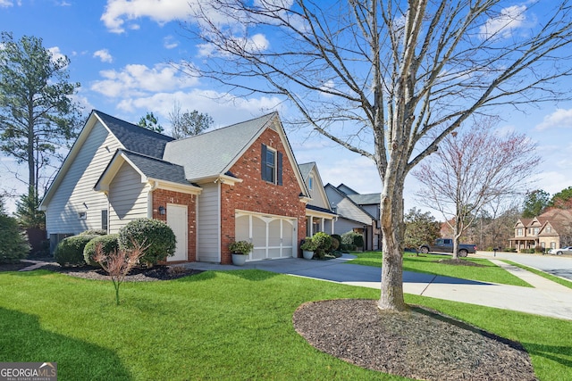 view of side of property with a garage and a lawn