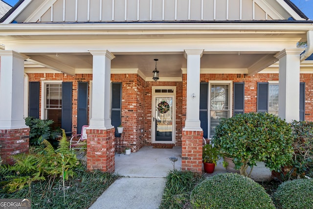 property entrance with covered porch