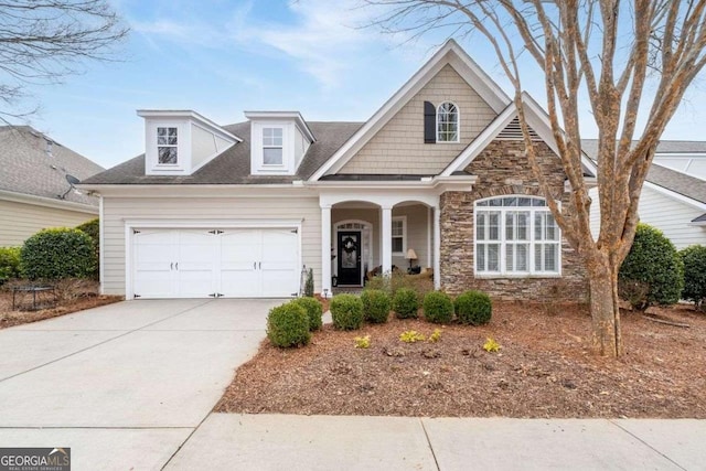 view of front of property with a garage