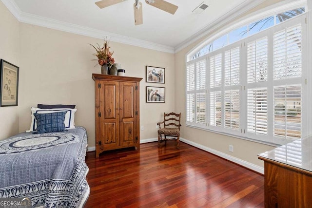 bedroom with ornamental molding, ceiling fan, and dark hardwood / wood-style flooring