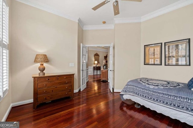 bedroom with dark wood-type flooring, ornamental molding, and ceiling fan