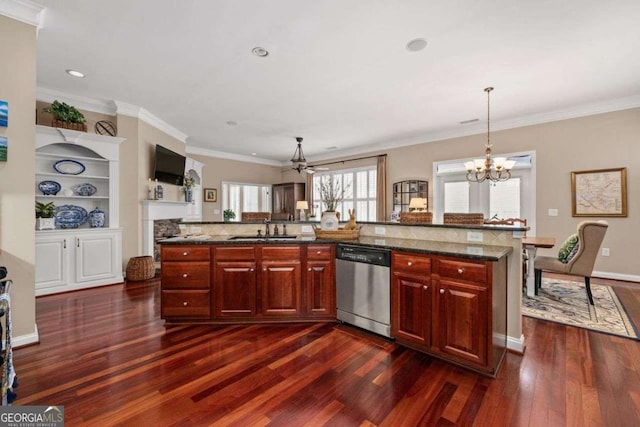 kitchen featuring sink, dishwasher, dark stone countertops, hanging light fixtures, and an island with sink