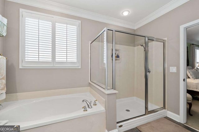 bathroom with independent shower and bath and crown molding