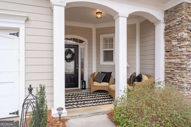 property entrance featuring a porch