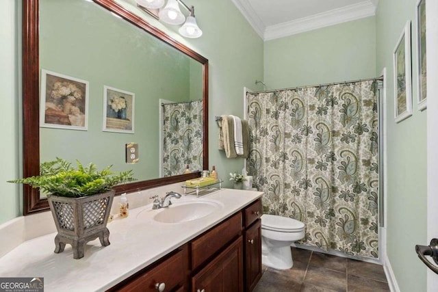 bathroom featuring vanity, tile patterned flooring, crown molding, and toilet