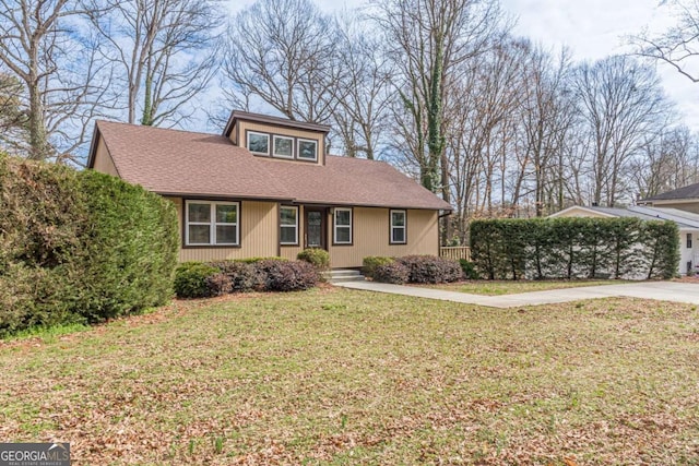 3847 Admiral Dr, Chamblee, GA 30341 - view of front of house featuring a front yard, roof with shingles, and covered porch