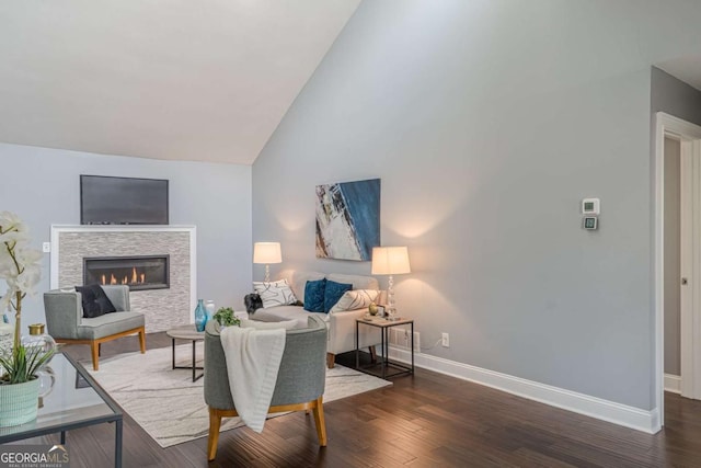 3847 Admiral Dr, Chamblee, GA 30341 - living room with wood finished floors, a fireplace, and high vaulted ceiling