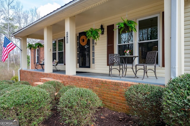 entrance to property featuring covered porch