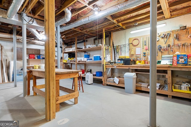 basement with a workshop area