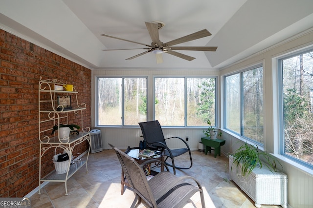 sunroom / solarium with ceiling fan