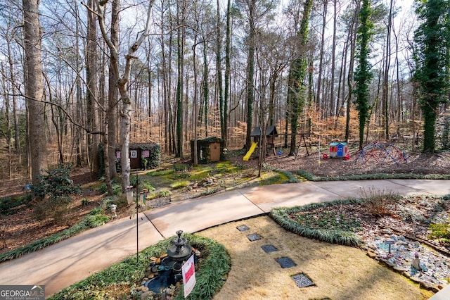 view of yard with a playground