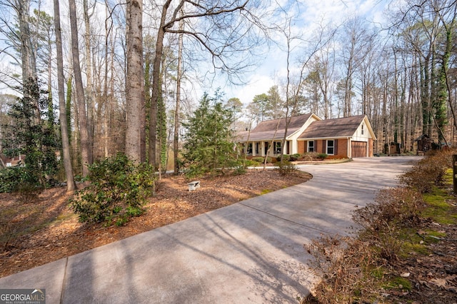 single story home with a garage