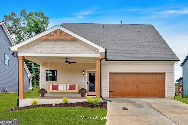 133 Old Alabama Rd SE, Emerson, GA 30137 - view of front of property with a ceiling fan, a front yard, roof with shingles, and concrete driveway