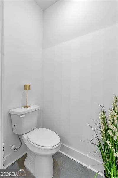 133 Old Alabama Rd SE, Emerson, GA 30137 - bathroom with toilet and baseboards