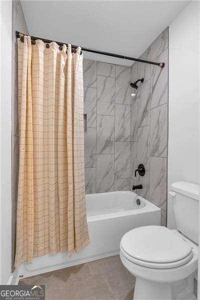 133 Old Alabama Rd SE, Emerson, GA 30137 - bathroom with shower / bath combination with curtain and tile patterned floors